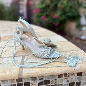 Pelle Moda Silver Heels for Elegant Occasions